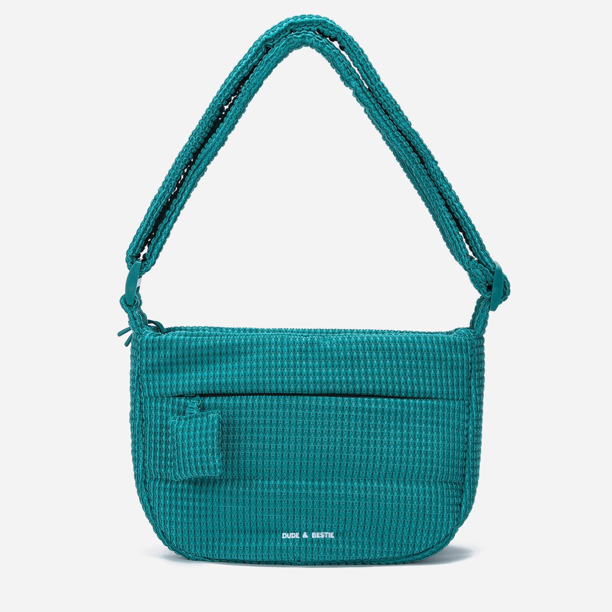 A teal color woven Corduroy Puff shoulder bag by Dude & Bestie Winter 2026