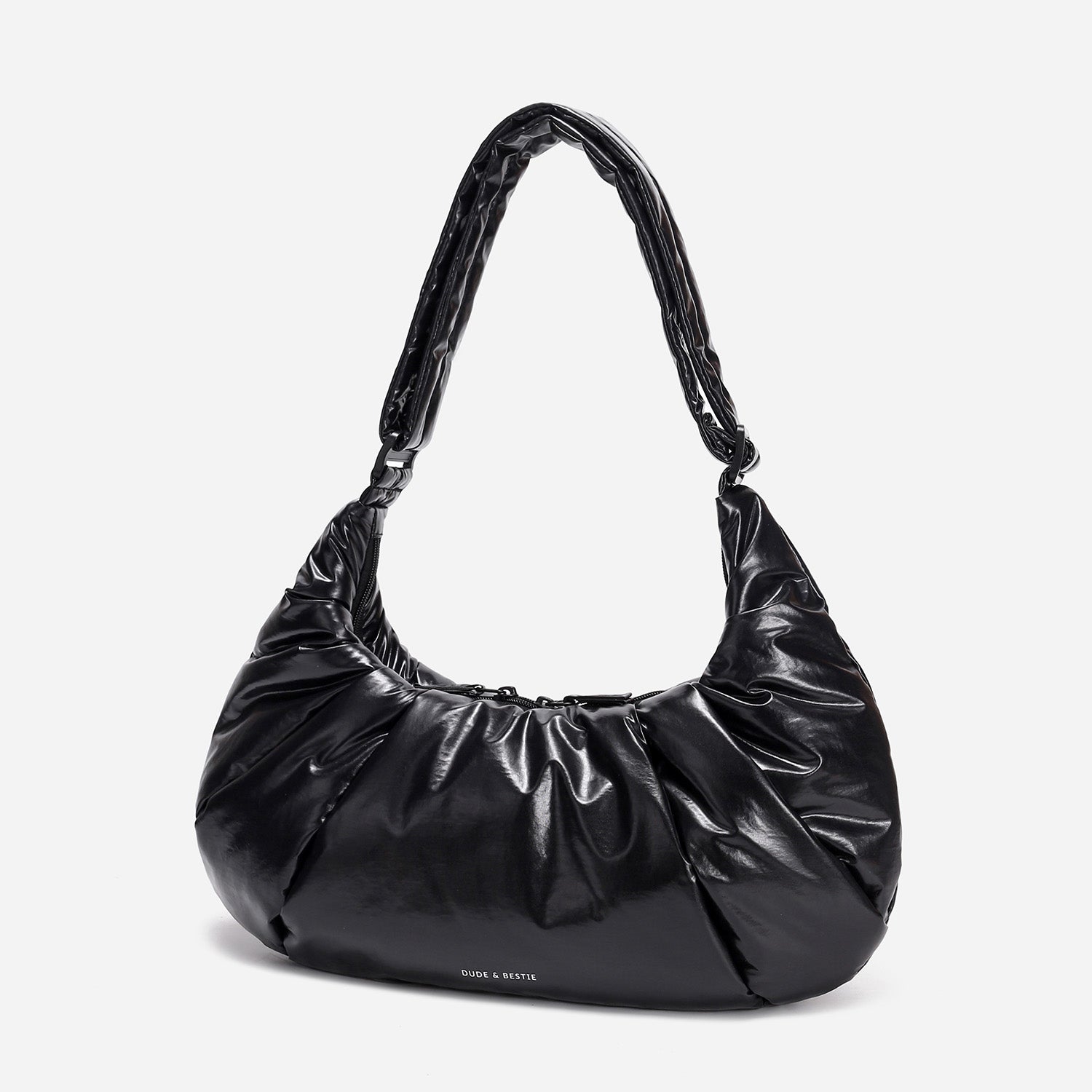 A black shiny Croissant-shaped shoulder bag with a single strap in polish black color